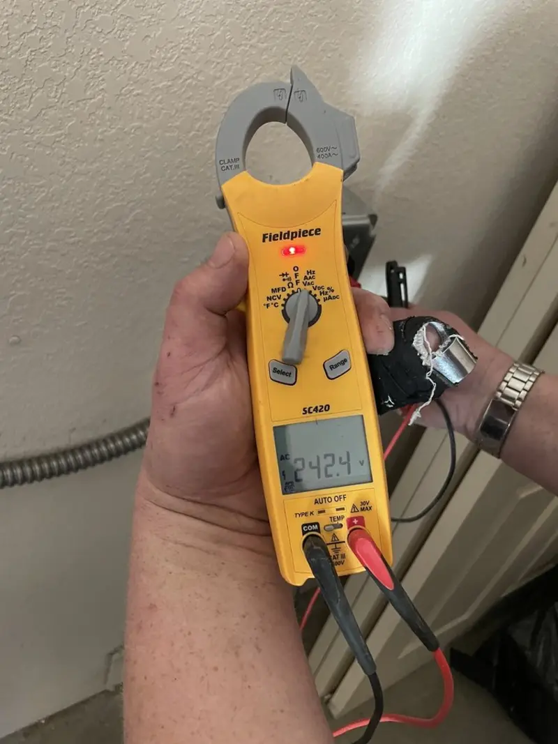 Voltage testing with clamp meter during Generator Installation in North Sioux City